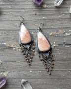 Bohemian statement dangle earrings with peach tones and chain fringe