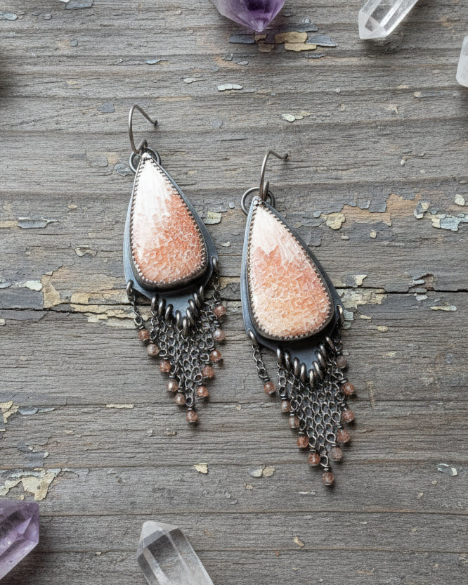 Bohemian statement dangle earrings with peach tones and chain fringe