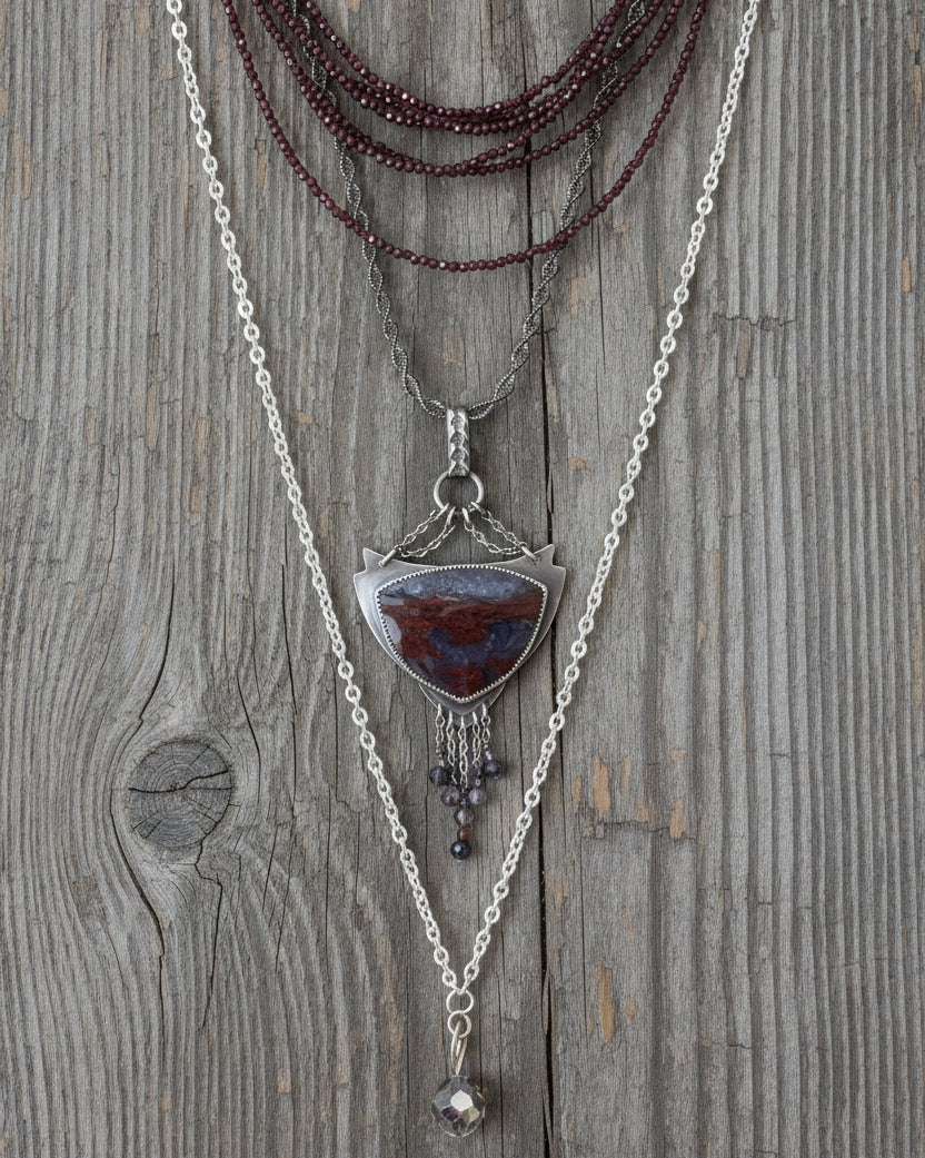 Chandelier drop necklace with bi-colored sapphire bead fringe shown on chain with layer necklaces (not included)
