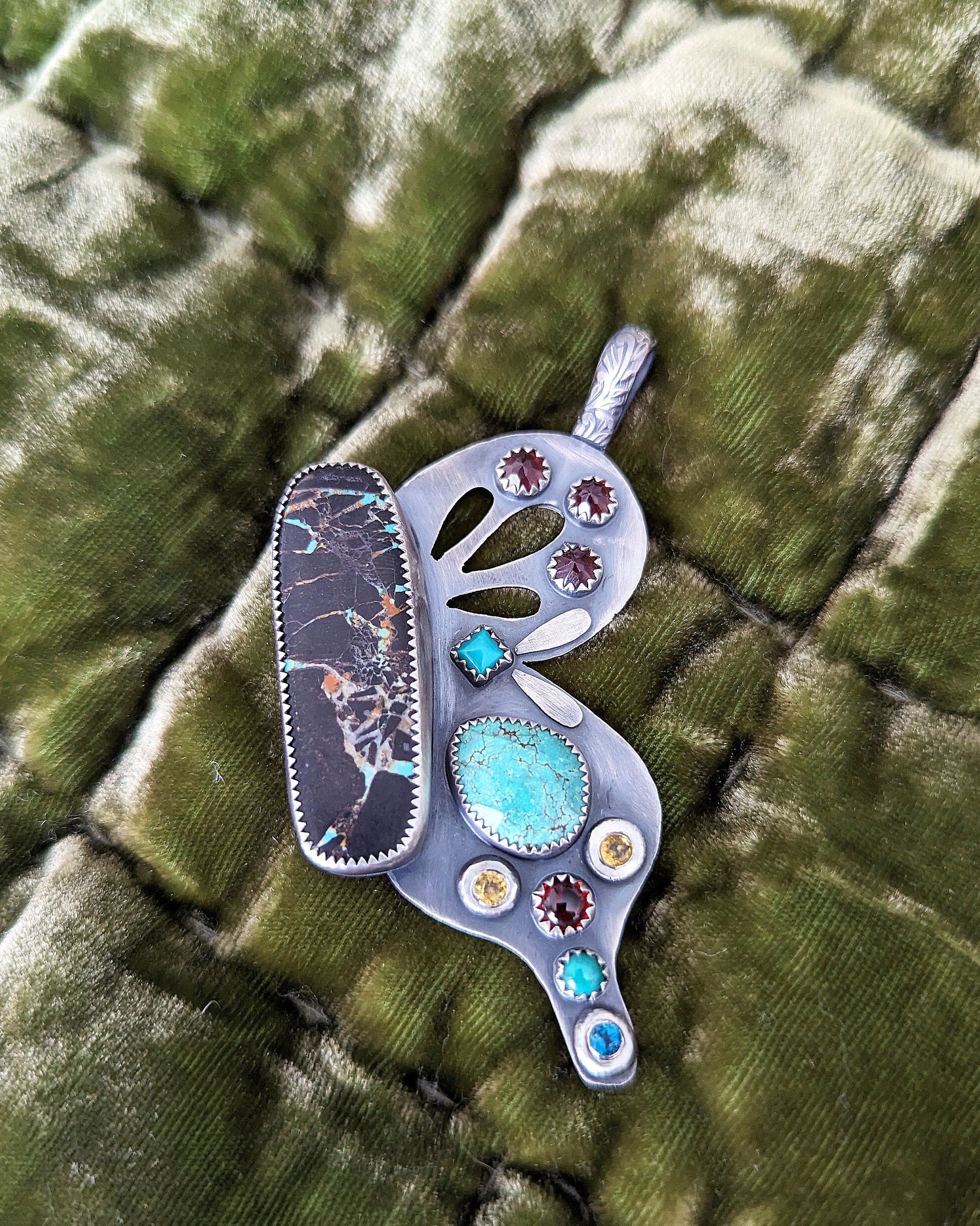 Southwestern butterfly pendant with turquoise gemstones in oxidized sterling silver
