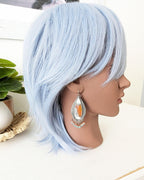 Pale aqua apatite and carnelian bead fringe beneath opal wood stones