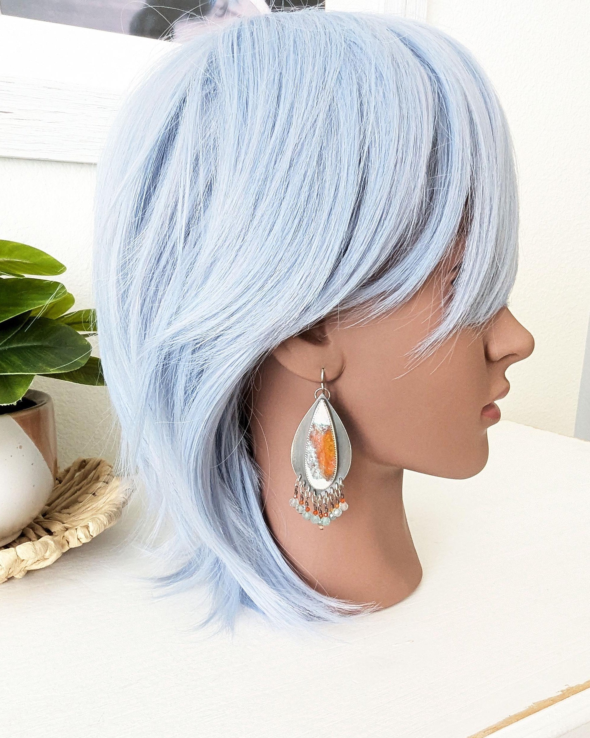 Pale aqua apatite and carnelian bead fringe beneath opal wood stones
