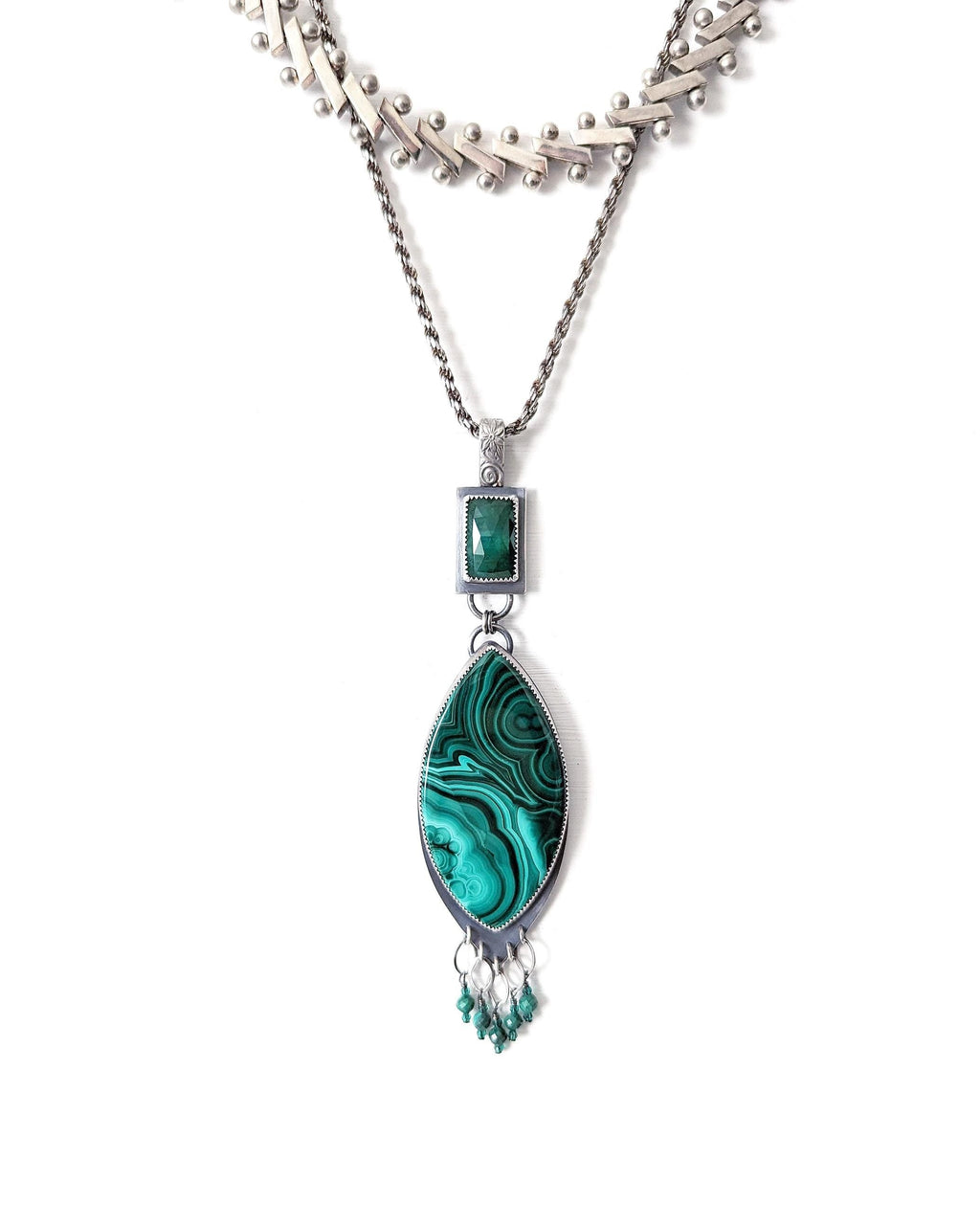 Boho luxe green gemstone pendant with malachite and emerald shown on chain with layering necklaces for styling