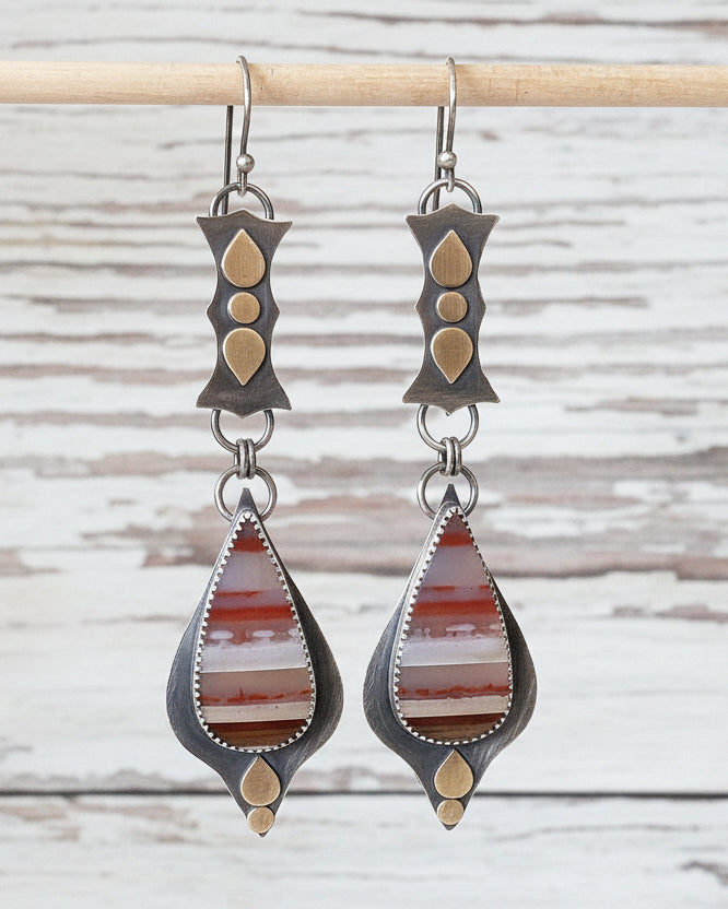 Bold yet wearable gemstone earrings with old-world design influence
