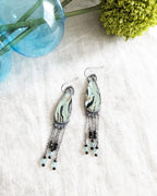 Oxidized sterling silver earrings with long chain fringe, green apatite, and black spinel beads
