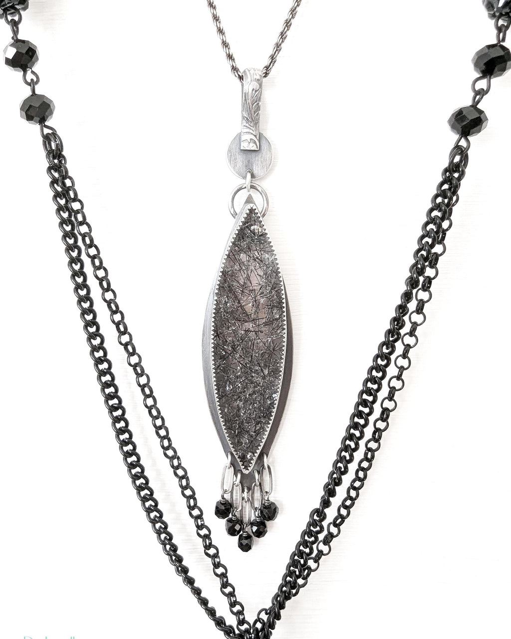 Black rutile quartz pendant in oxidized sterling silver close up on chain (not included)