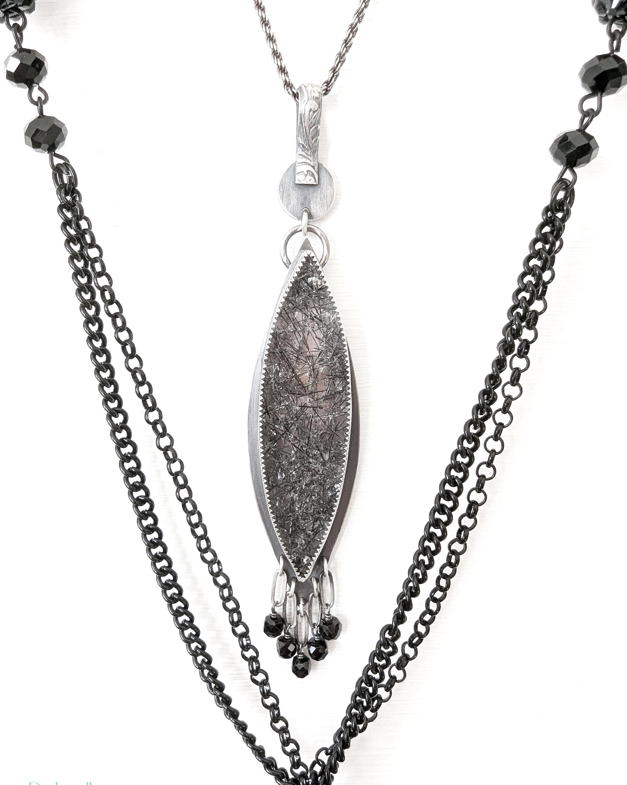 Black rutile quartz pendant in oxidized sterling silver close up on chain (not included)