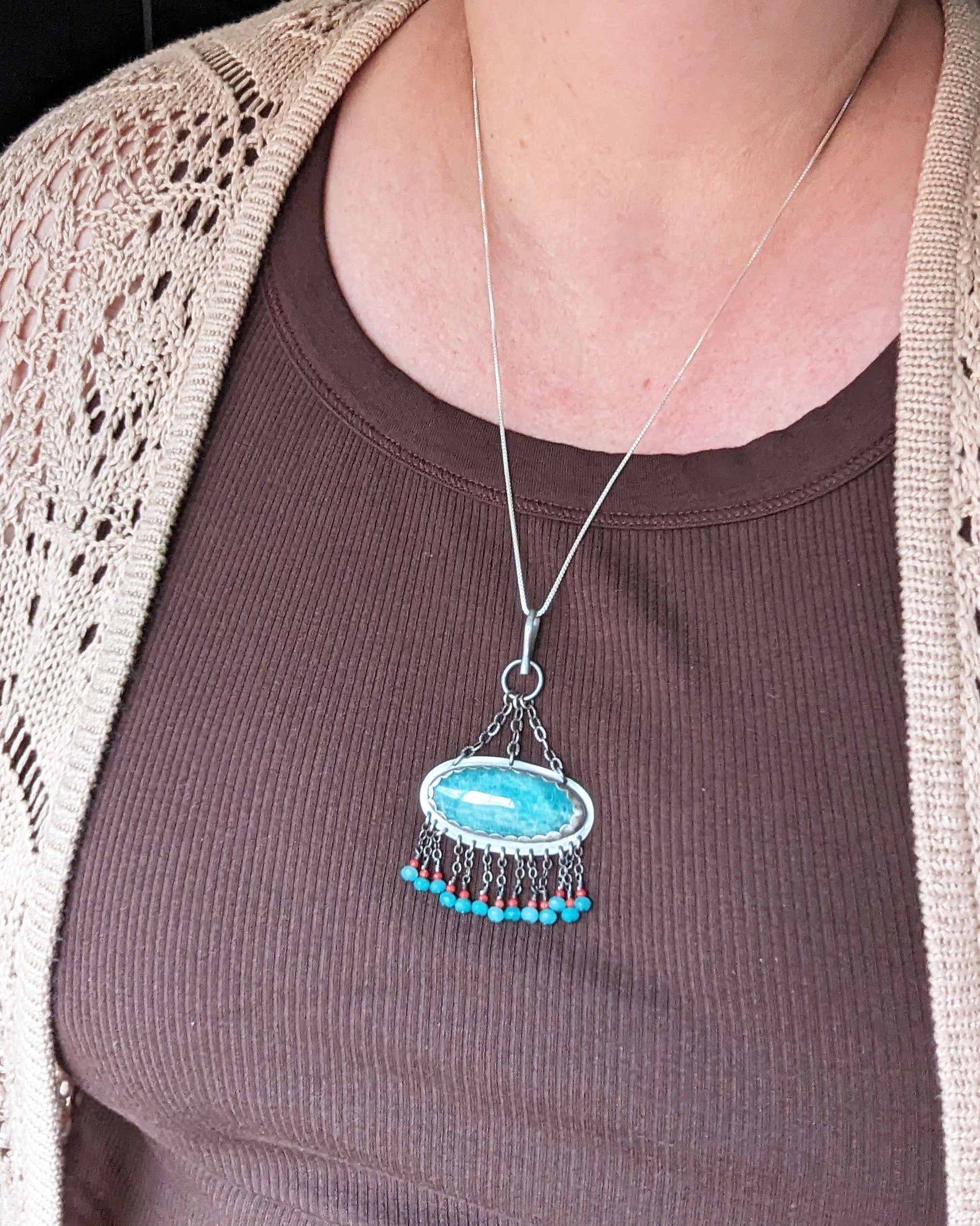 Kitschy Coral Pendant by Rebellenhaus shown on bust for scale