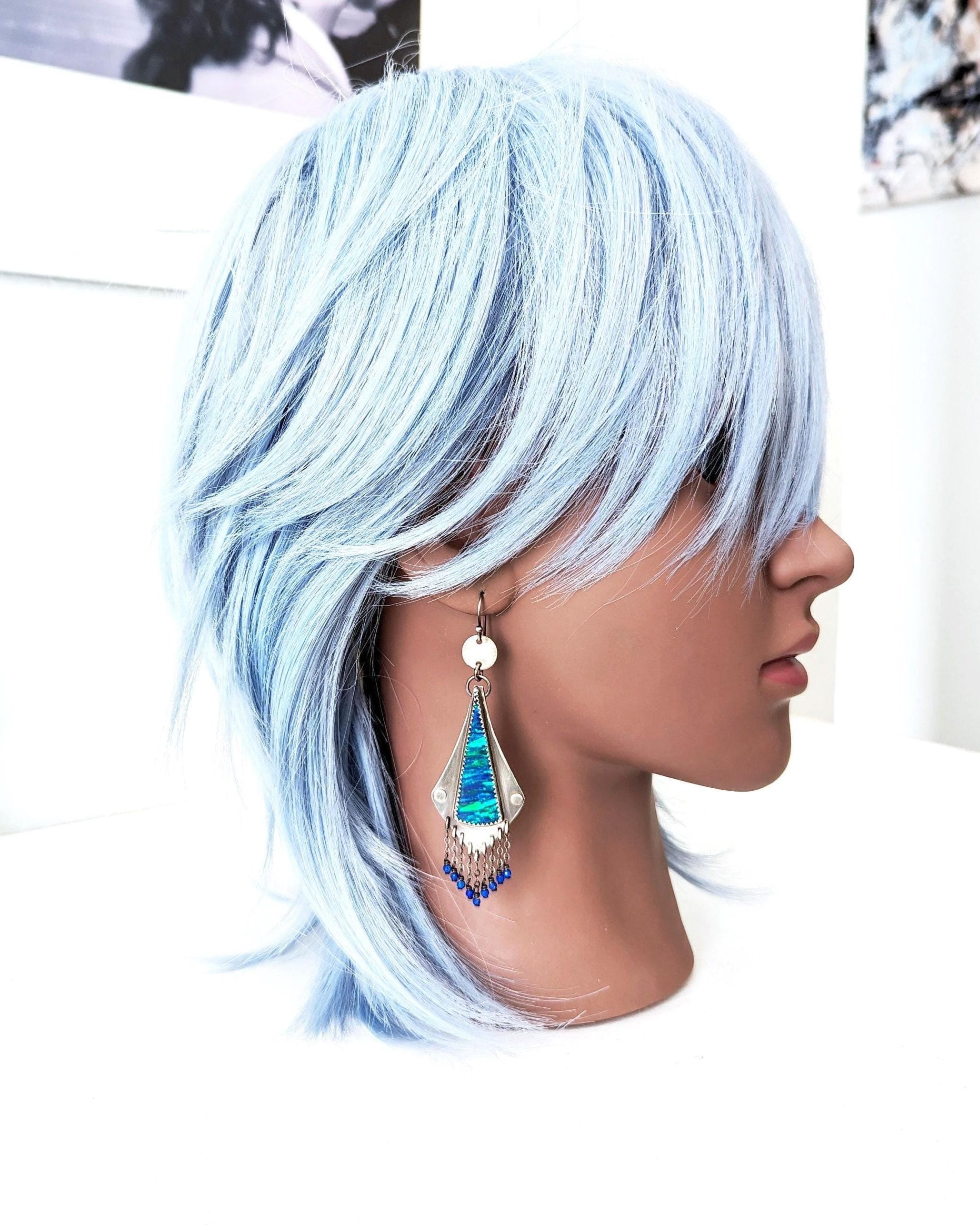 Lapis lazuli beaded chain fringe earrings on a mannequin for scale