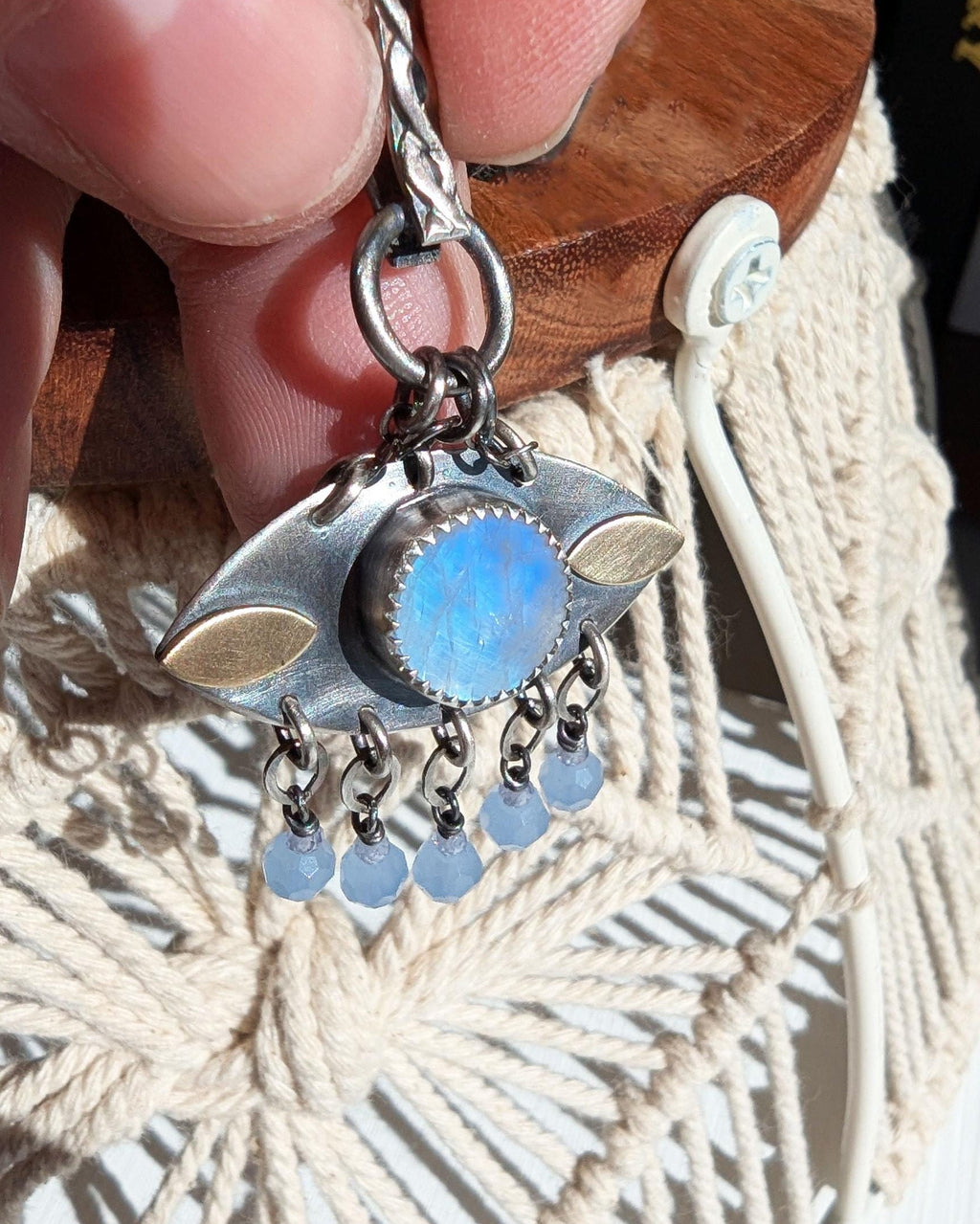 Protective talisman necklace with sterling silver and brass detail