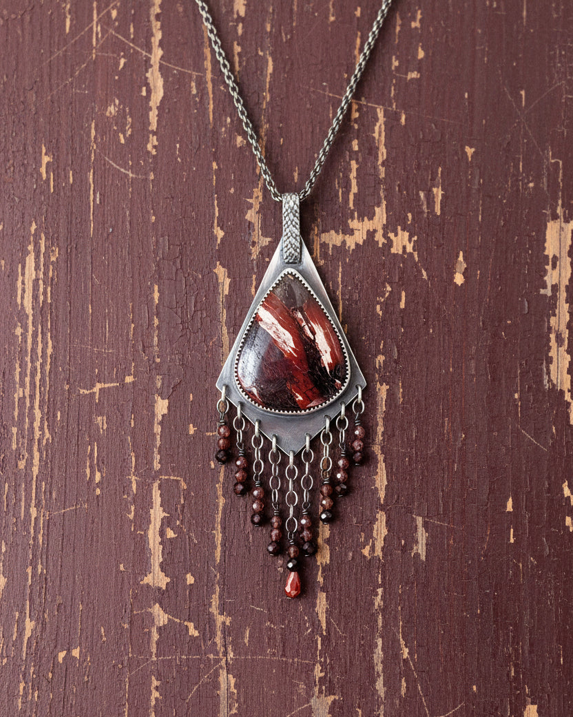 Collector gemstone pendant featuring snakeskin jasper and garnet on chain (not included)