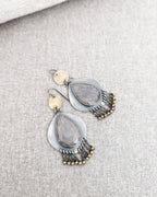 Boho chic moonstone earrings with brass coin and heishi bead fringe