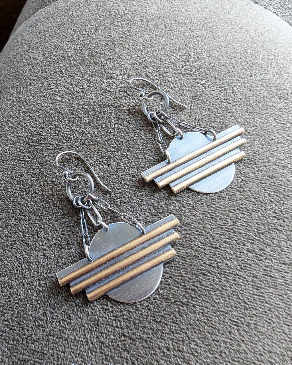 Geometric silver and brass chandelier earrings