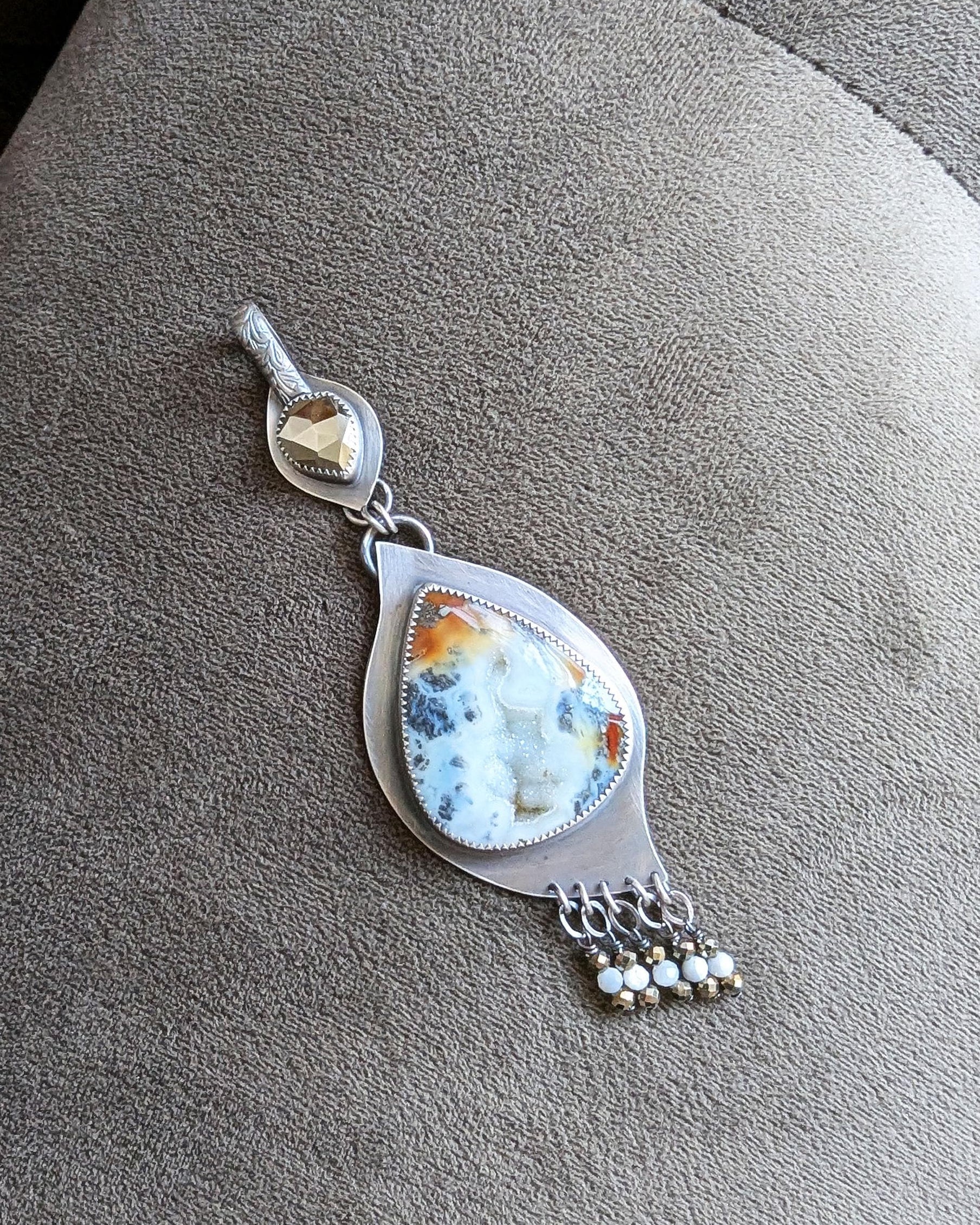 Marcasite druzy agate pendant with red and orange swirling tones