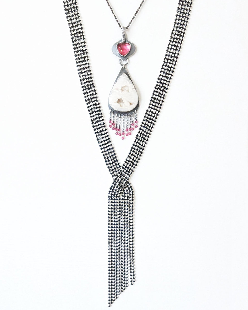 Pink and white gemstone artisan pendant shown on chain with fun layering necklace to show styling option (not included)