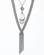 Pink and white gemstone artisan pendant shown on chain with fun layering necklace to show styling option (not included)