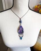 Bold gemstone pendant with abalone quartz and treated labradorite on bust for scale XL