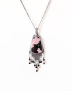 Southwestern geometric sterling silver pendant with bold rhodonite center shown on chain (not included)