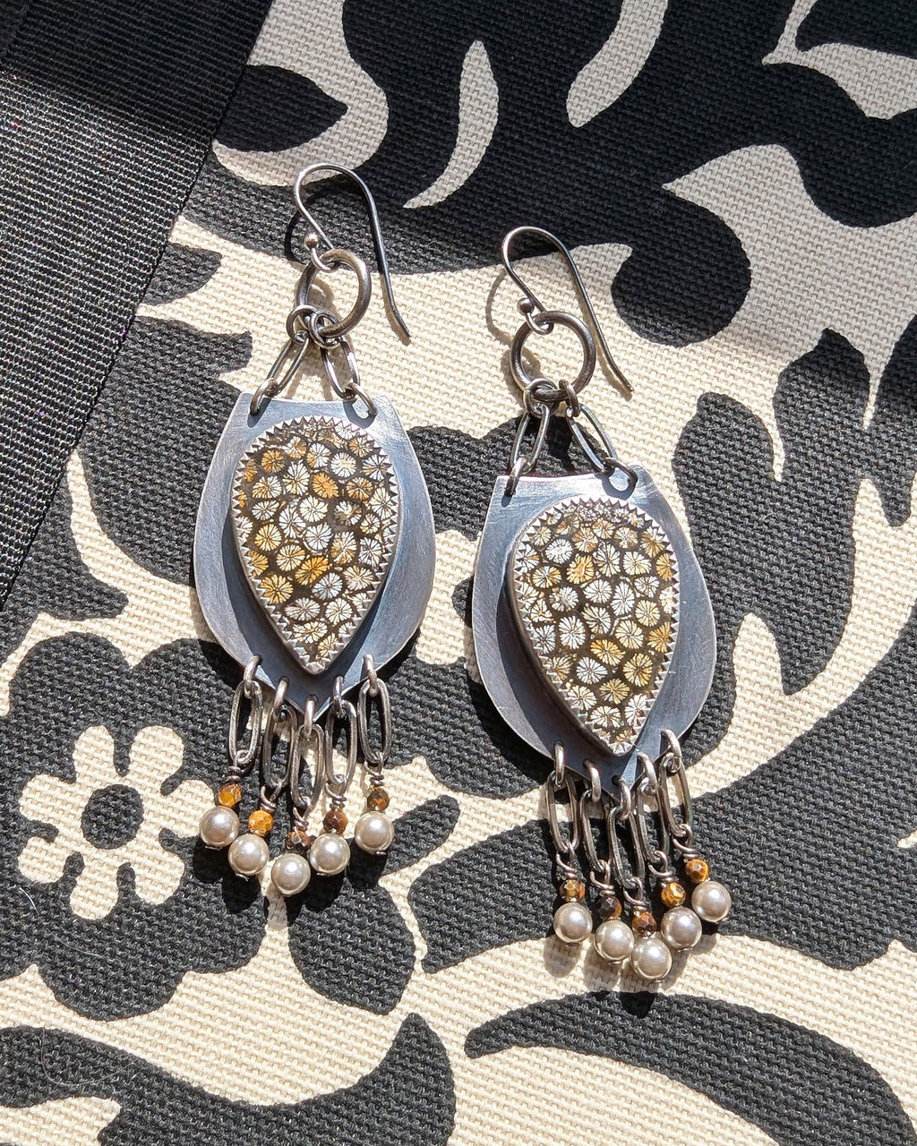 Teardrop fossil coral earrings with tiger’s eye bead fringe