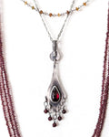 Rose cut red garnet pendant in oxidized sterling silver on chain with layering necklaces (not included)