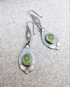 Boho dangle earrings featuring Tibetan turquoise and warm brass accents