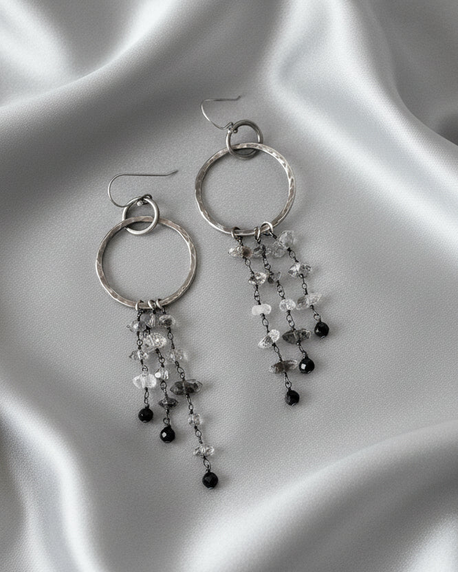 Linked oxidized sterling silver hoops with hammered asymmetrical design
