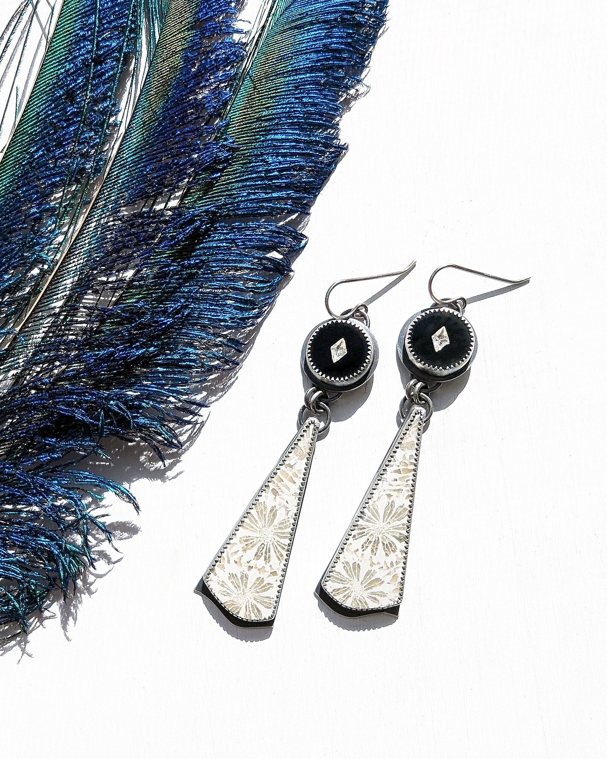 Double-stone drop earrings with white and grey fossil coral