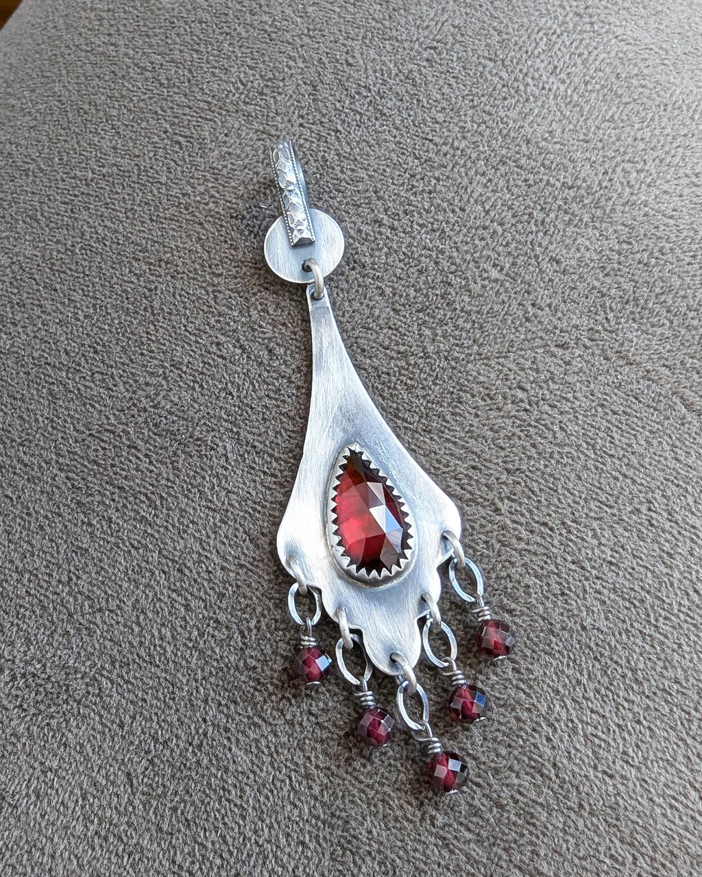 Small elegant garnet statement necklace with dark silver tone