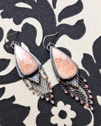 Close up of peach scolecite stones with natural mosaic patterns
