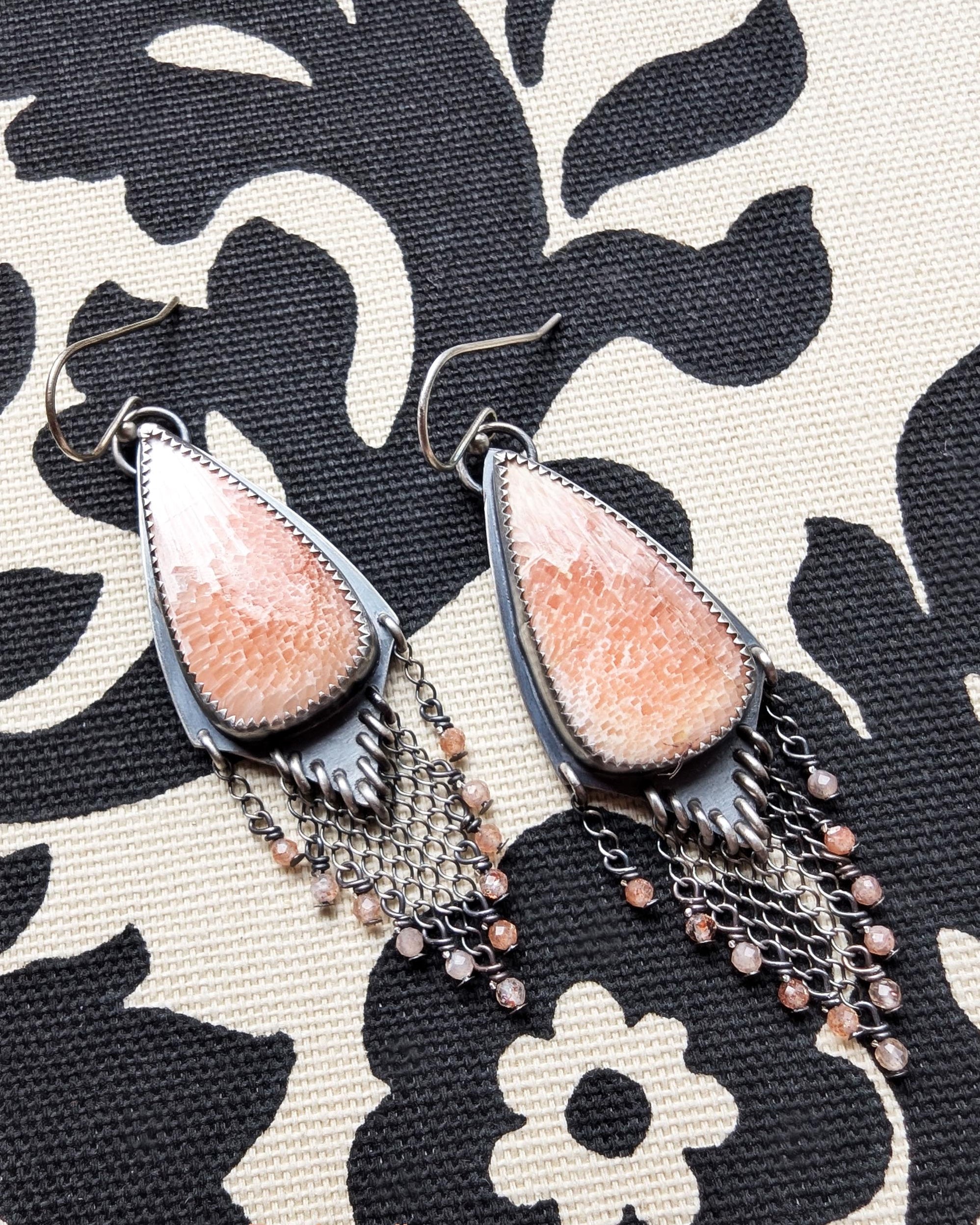 Close up of peach scolecite stones with natural mosaic patterns