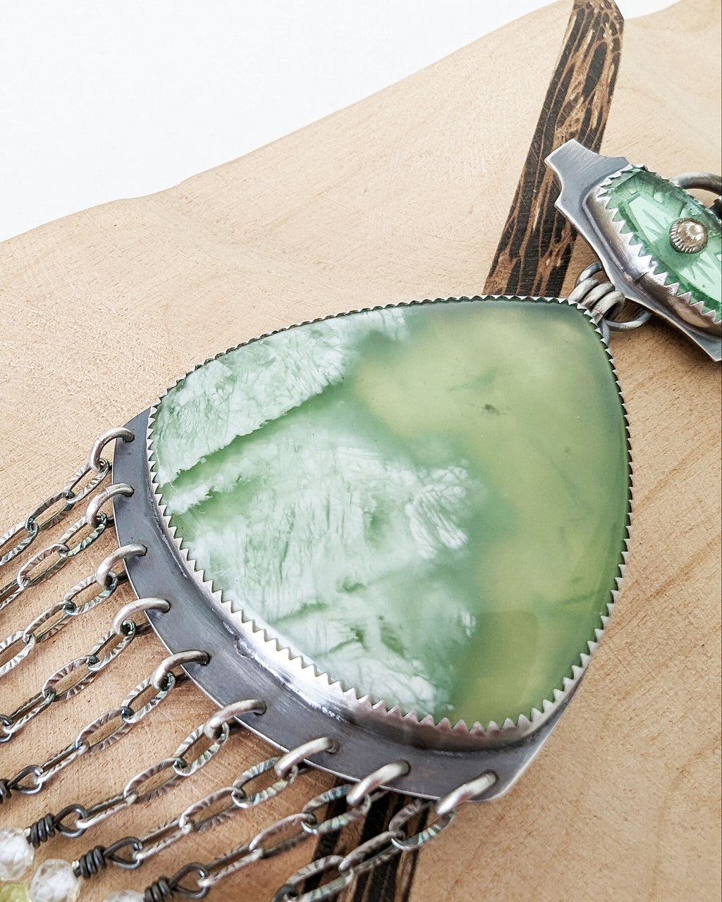 Close up of plume included serpentine stone with lime green tones