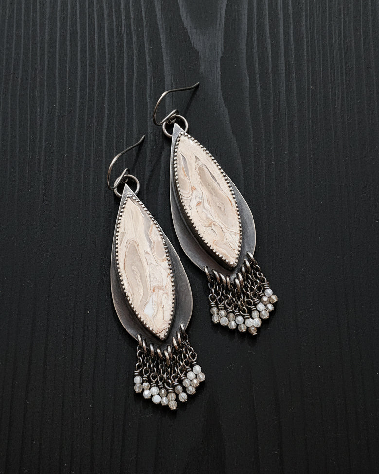 pair of swirl pattern gemstone earring with beaded fringe