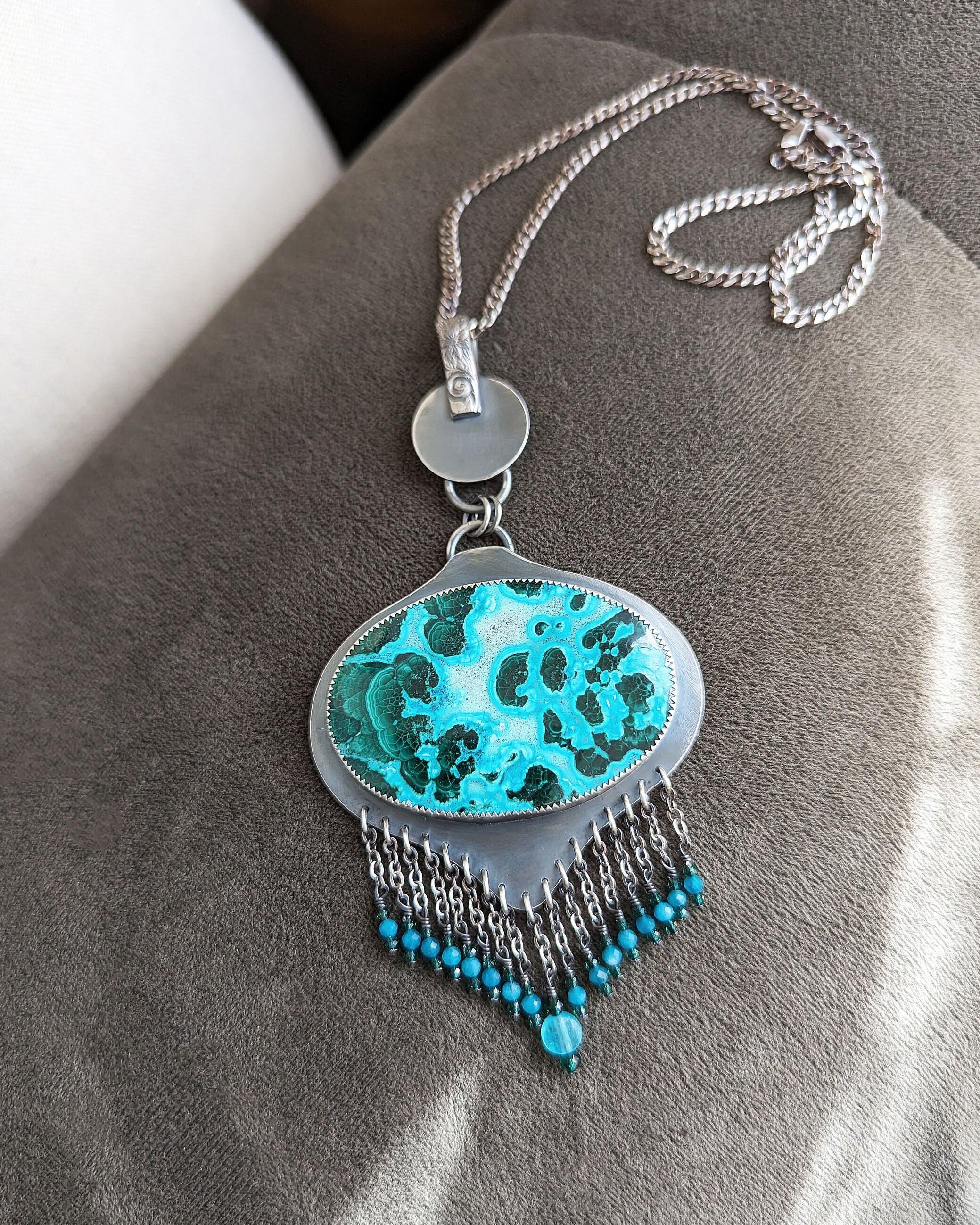 Large oval stabilized chrysocolla malachite in oxidized sterling silver shown on chain (not included)