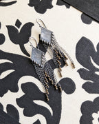 Oxidized sterling silver earrings with inverted metallic pyrite bead fringe
