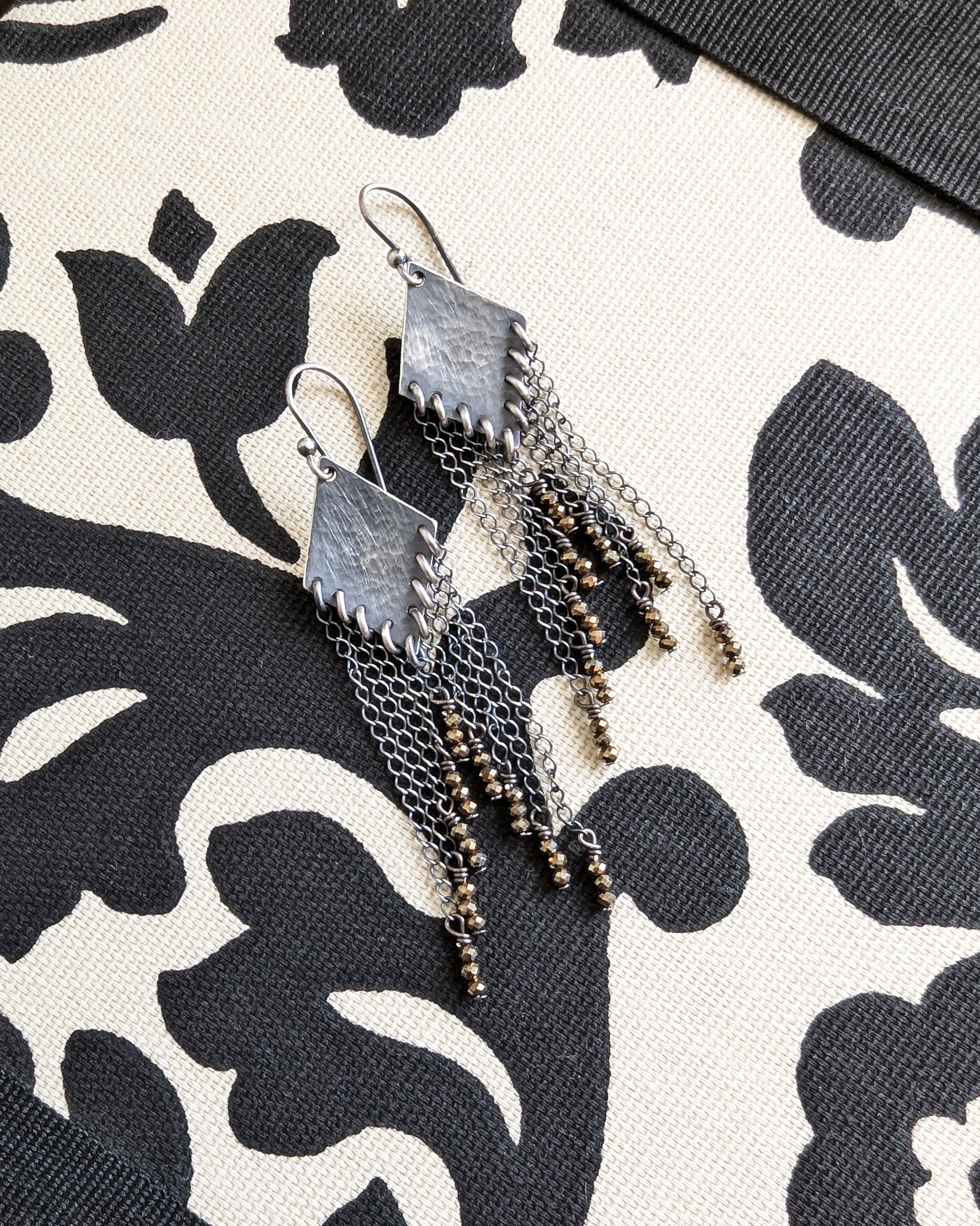 Oxidized sterling silver earrings with inverted metallic pyrite bead fringe
