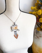 One of a kind sugar palm agate druzy pendant with filigree design shown on bust for scale