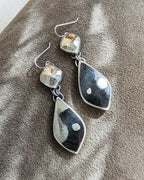 Oxidized sterling silver earrings featuring metallic gold pyrite stones