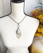 The Golden Hour Pendant by Rebellenhaus on bust for scale