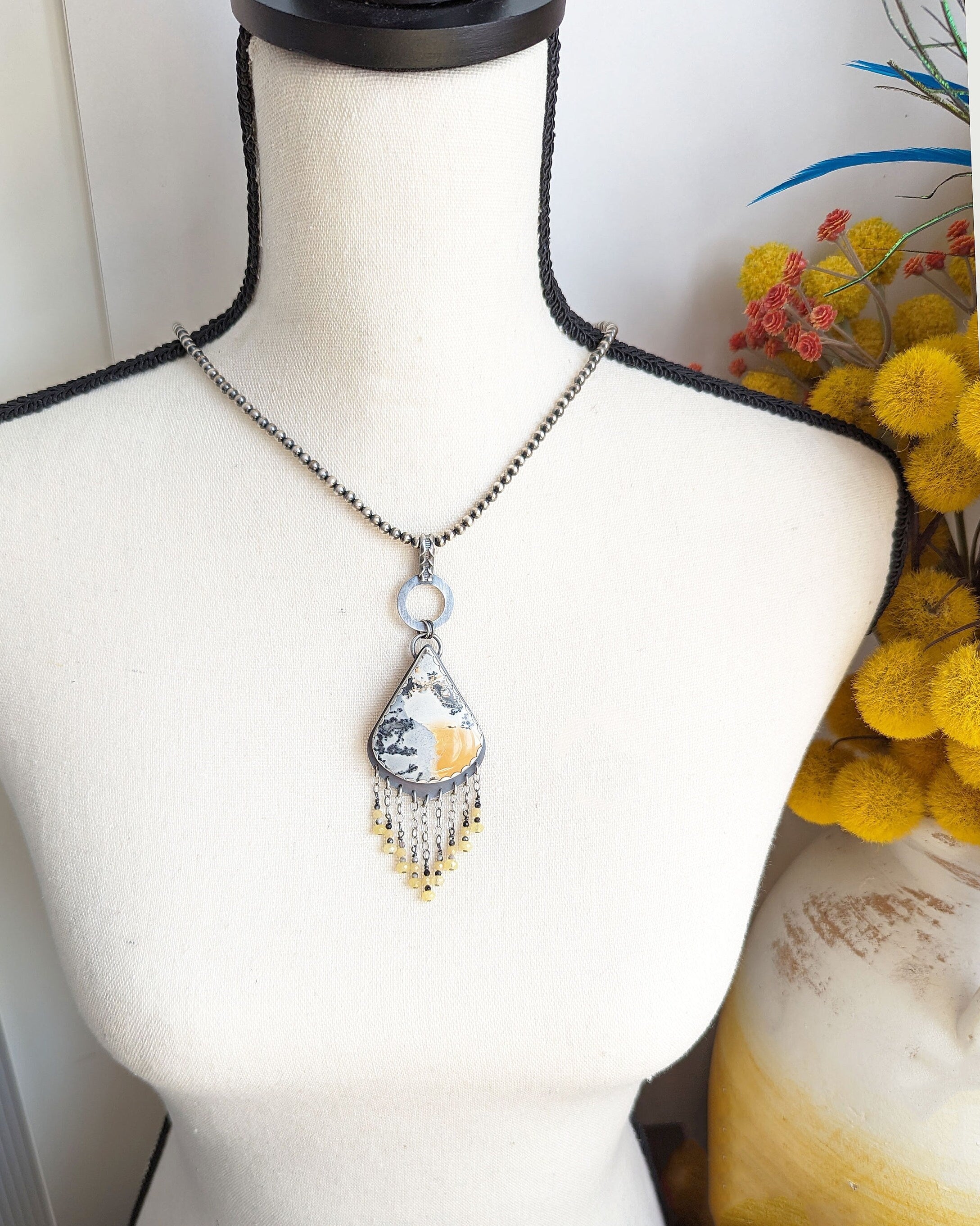 The Golden Hour Pendant by Rebellenhaus on bust for scale