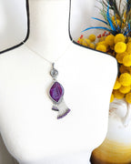 Oxidized sterling silver pendant with druzy agate center and black tourmaline-amethyst fringe shown on bust for size