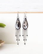 Dendritic opal leaf earrings with black spinel and white howlite fringe