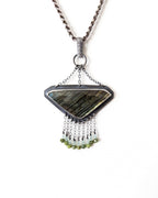 Aquamarine and nephrite jade bead fringe on geometric labradorite pendant
on a chain without flashing