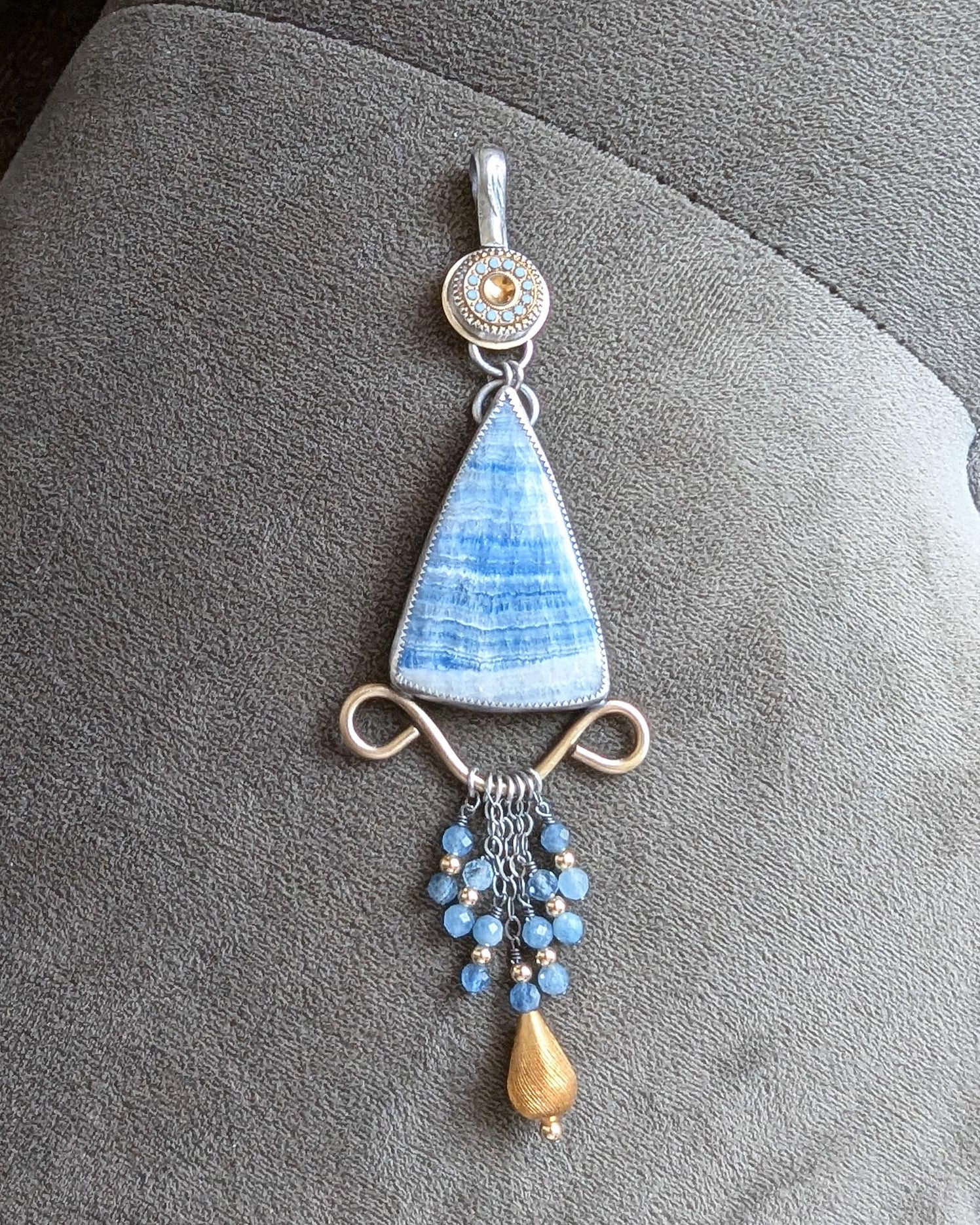 Artisan statement pendant with blue and gold palette