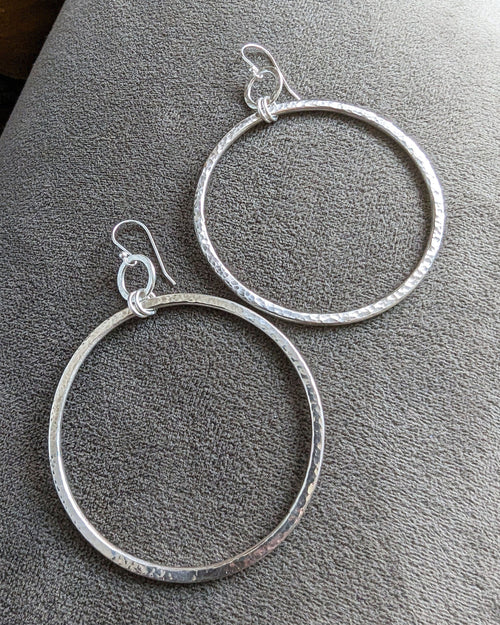 Hand hammered silver statement hoop earrings in modern boho style