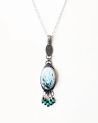 Large oval scolecite gemstone pendant with oxidized sterling silver bail shown on chain (not included)