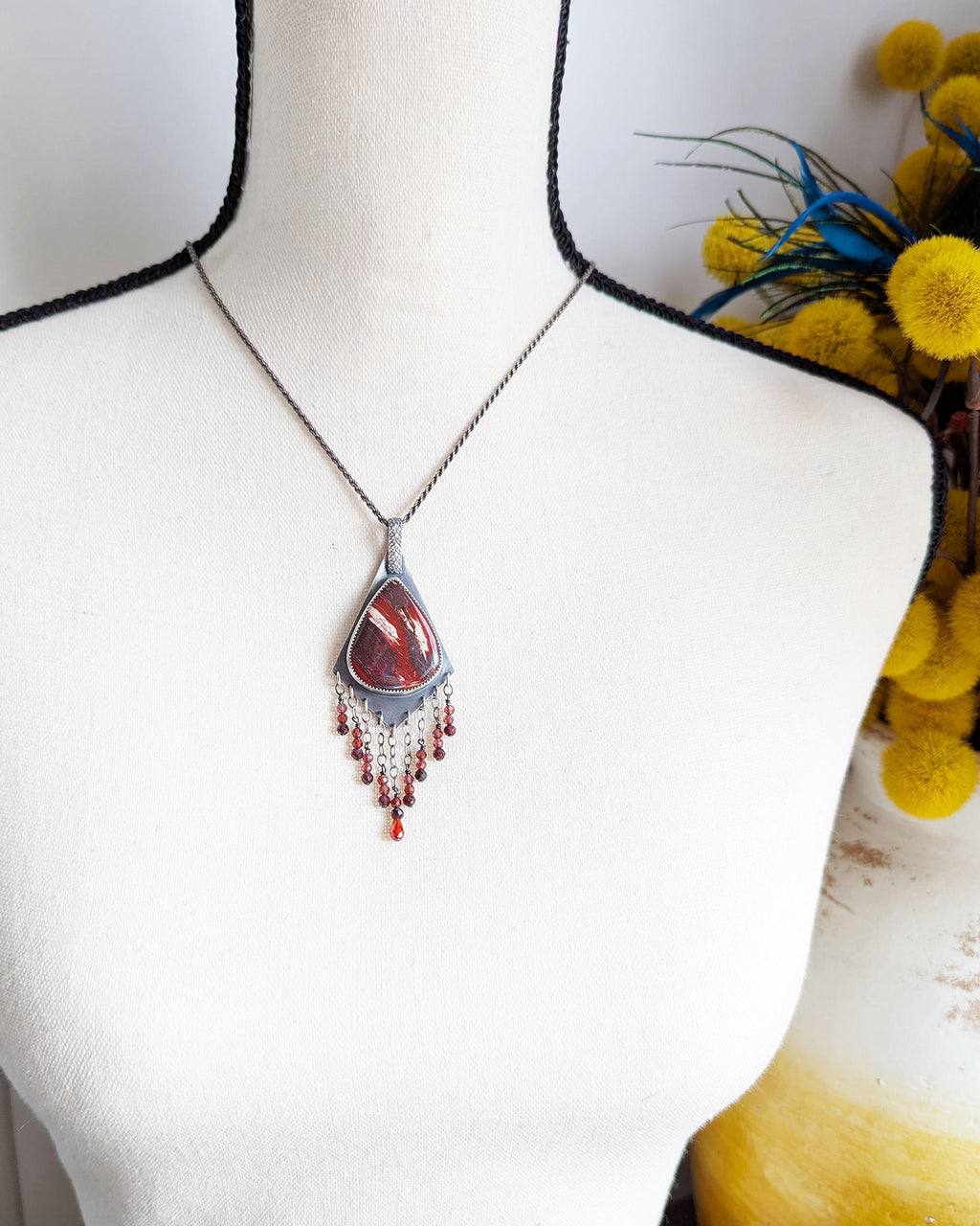 Artisan sterling silver pendant inspired by desert sunset tones