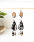Petrified palm root agate earrings with black and white polka dot pattern