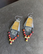 Bold summer statement earrings with radiant lemon tones
