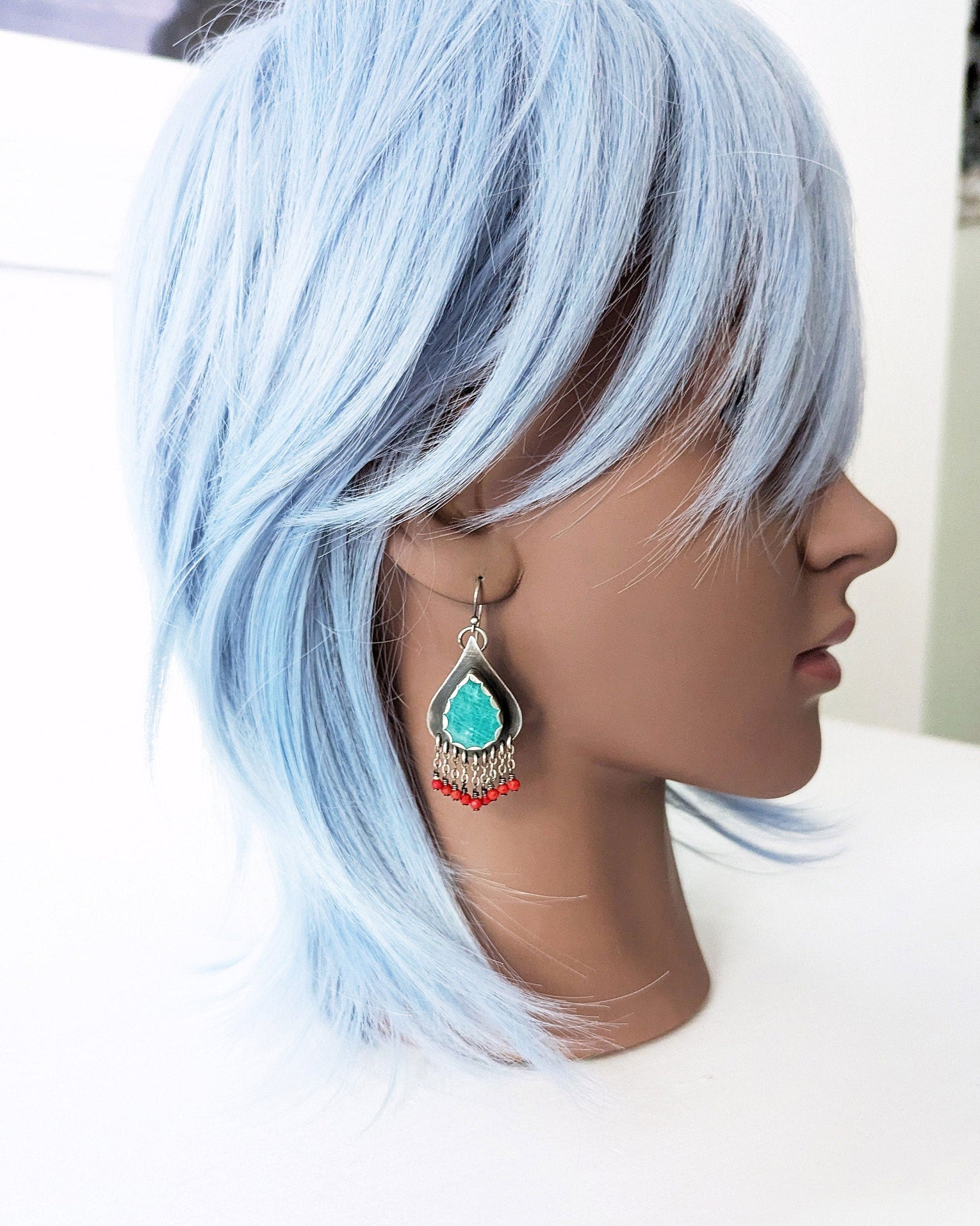 Tropical statement earrings with turquoise and red contrast