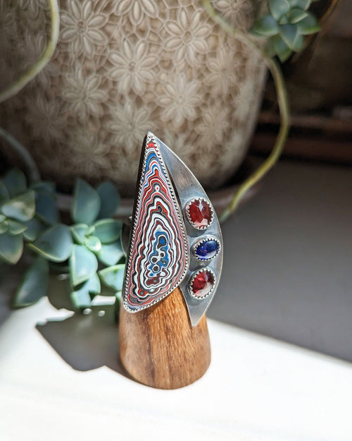 Fordite sailboat ring made from upcycled Jeep Wrangler paint in sterling silver